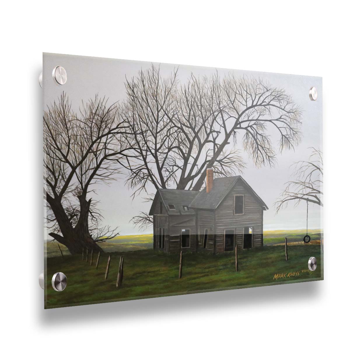 A painting of an old, abandoned house. There is a tire swing hanging on a bare tree in the yard, and the fields in the background are buried in fog. Printed on acrylic.