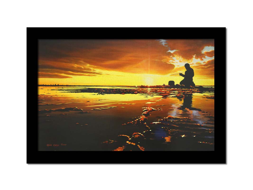 A painting of icy waters reflecting the sunset, with a fisherman silhouetted in the light, sitting with his fishing pole. Printed on canvas and framed.