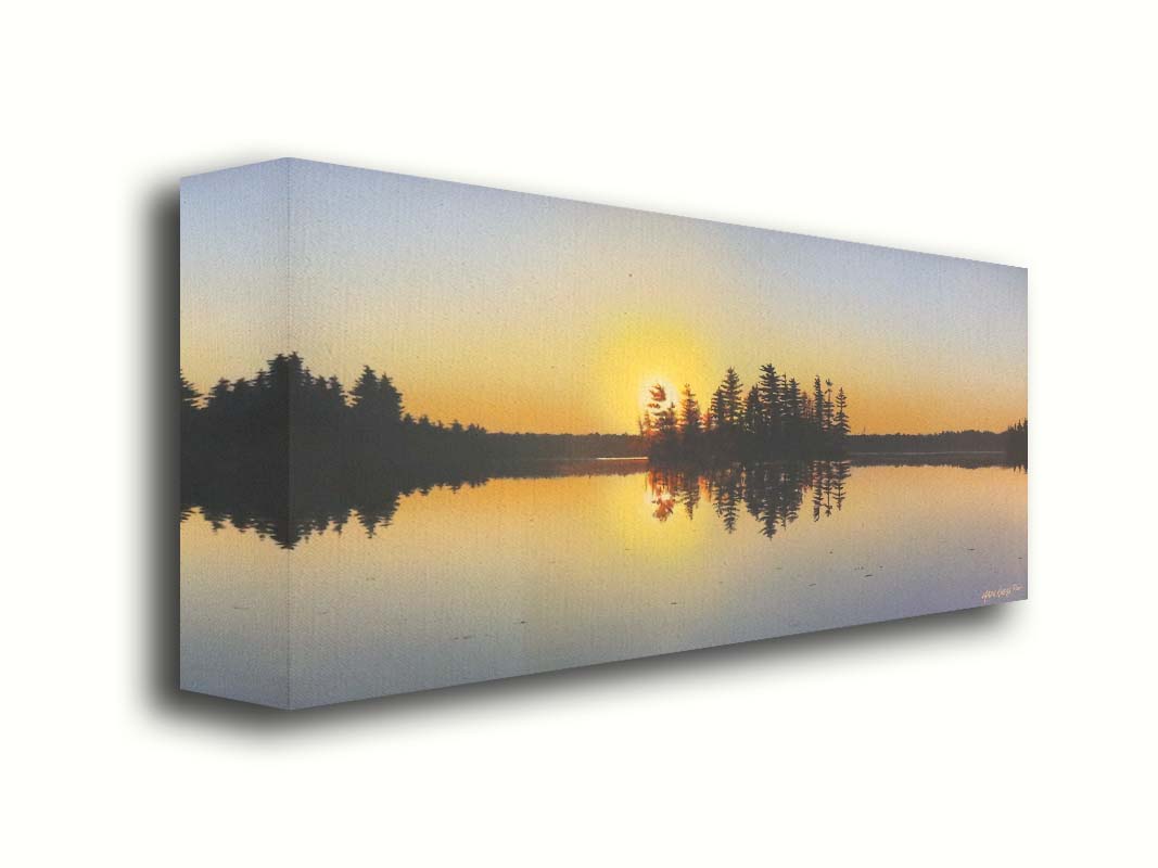 A painting of a low sun reflecting off the waters of a lake, surrounded by forest. Printed on canvas.