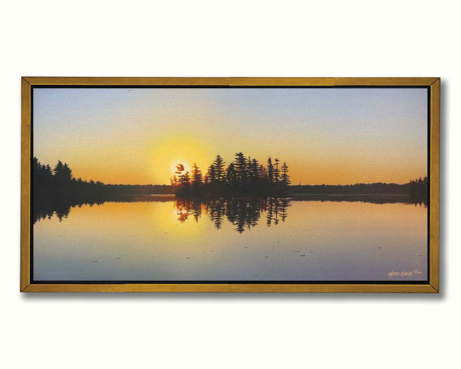 A painting of a low sun reflecting off the waters of a lake, surrounded by forest. Printed on canvas in a float frame.