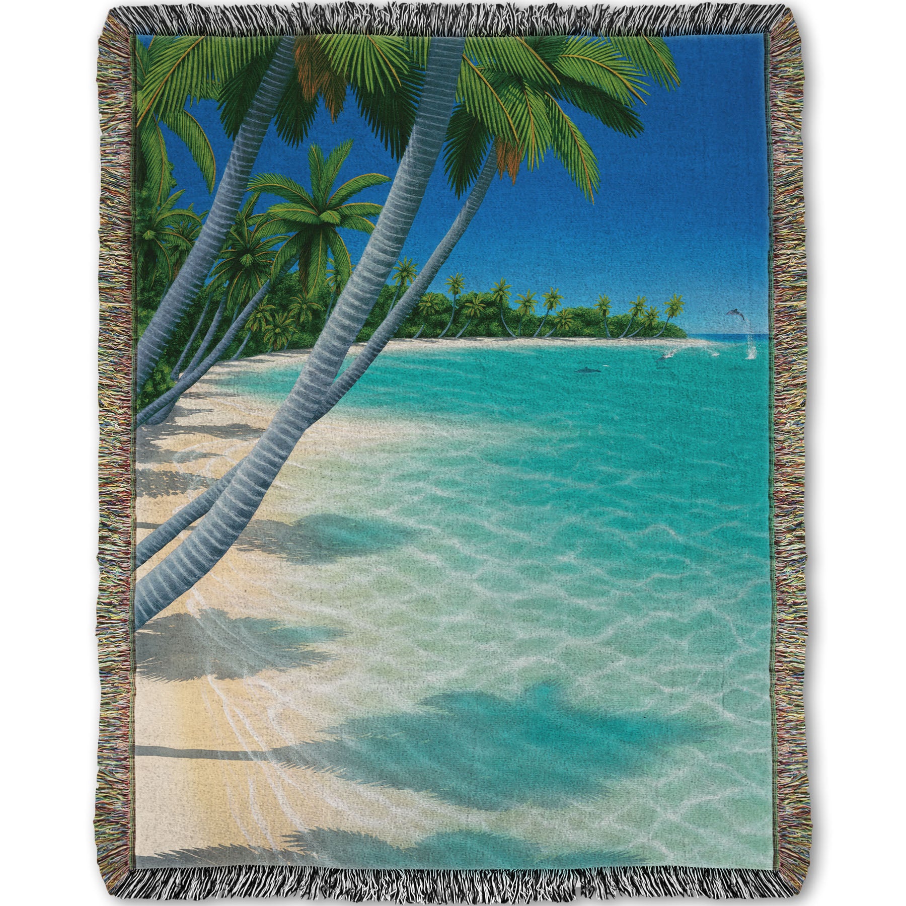 A woven throw blanket designed with a vibrant painting of a landscape beach scene, with leaning palm trees and clear waters. Leaping dolphins swim in the distance, approaching the shore.
