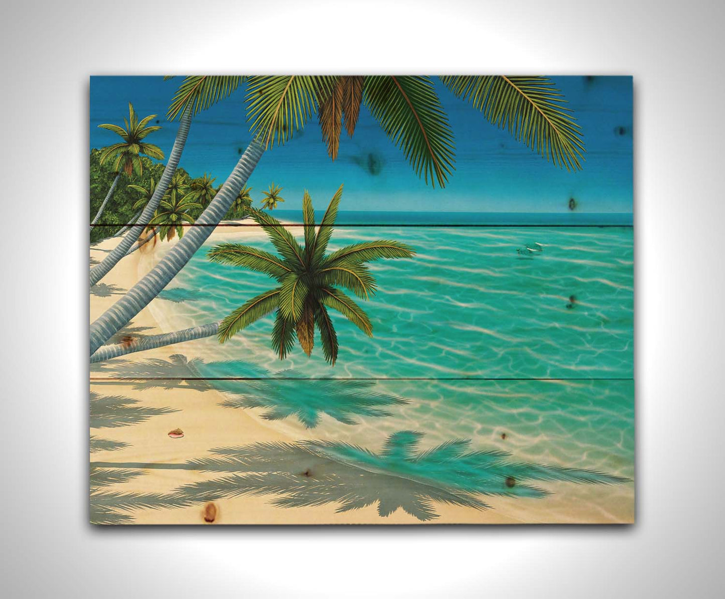 A painting of a white sand beach with growing palm trees and conch shells. Sea turtles swim through the clear blue waters. Printed on a wood pallet.