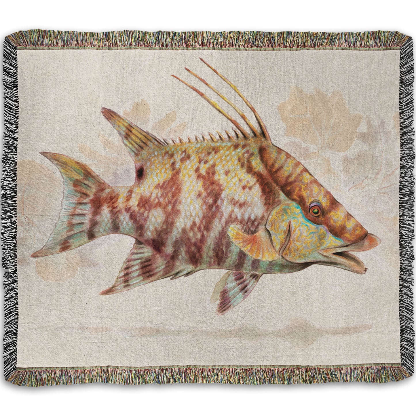 A woven throw blanket designed with a painting of a hogfish against a soft coral background, all isolated in a warm neutral space.
