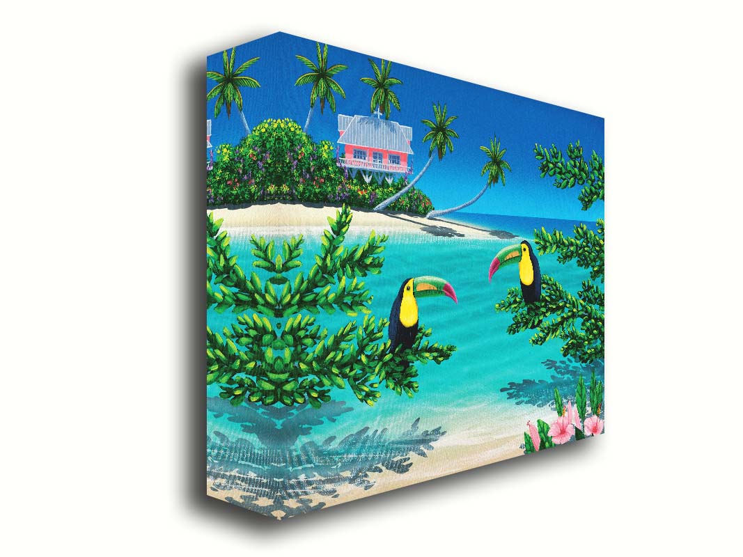 A vibrant painting of an island beach scene, featuring two toucans perched on plants in the foreground, and a bright house on stilt foundations in the background. Printed on canvas.