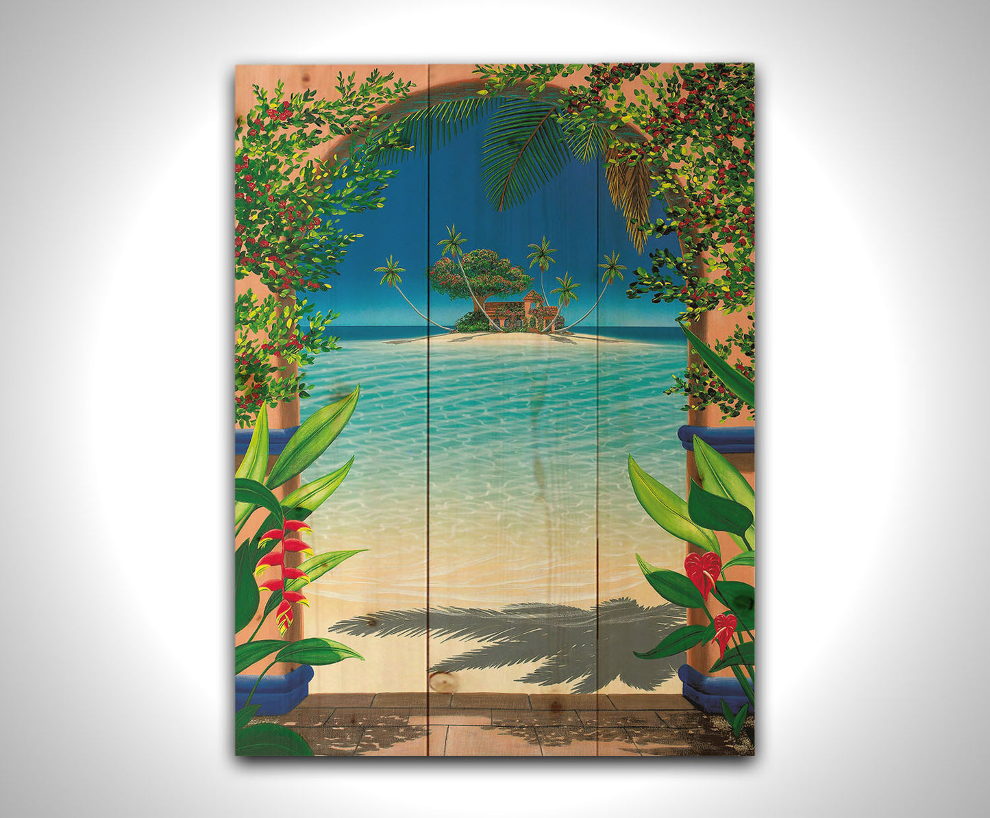 This landscape painting depicts a view through an archway facing the sea, with a sandy island and arched house in the center. Tropical plants bloom all around. Printed on a wood pallet.