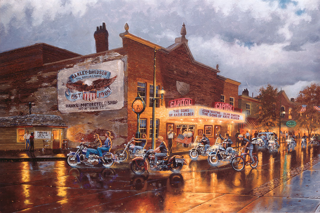 A painting of a group of bikers riding their motorcycles down a town road past a Harley Davidson motorcycle shop, a movie theater, and other shops. The sky is cloudy, and the shop lights reflect off the damp pavement.