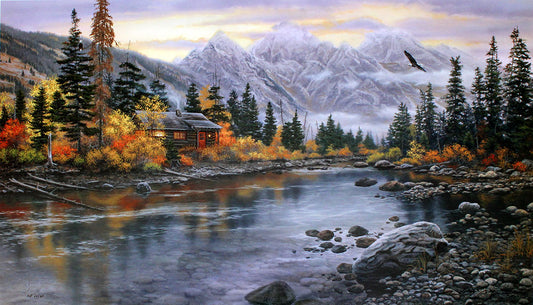 A rocky mountainside landscape focused on a rustic cabin, surrounded by a mixed forest of deciduous and coniferous trees, beside a shallow river.