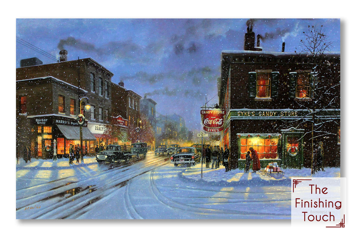 A landscape painting of a snowy city street in 1940s or 1950s America, illuminated by streetlights and lights from inside shops, including a candy store and barber.