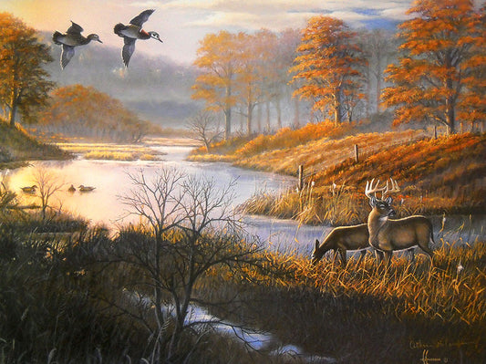 A scenic landscape painting of a marsh at golden hour with autumn trees, wood ducks flying overhead, two deer grazing in the foreground, and a soft misty background.