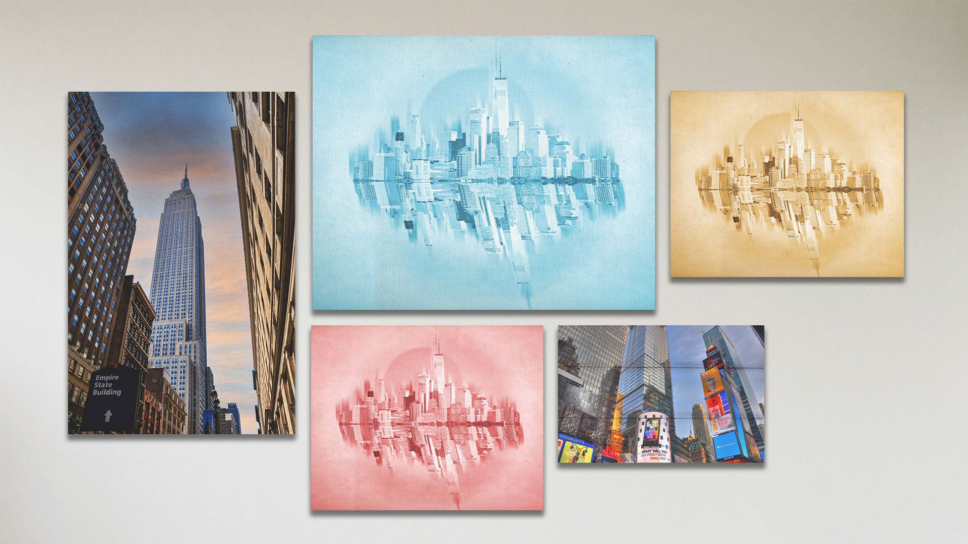 A collage of art in the standard Blue City package, including a box board photograph of Times Square in New York City, a canvas photograph of the Empire State Building in New York City, and three canvas photographs of the city skyline in red, yellow, and blue.