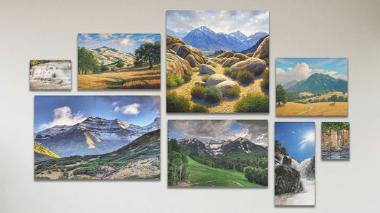 A collage of art in the standard First Snow Timpanogos package, including a box board photo of a small waterfall at an old mill; a box board photo of a waterside cliff face; three canvas photos of Sundance Ski Resort, Mount Timpanogos, and Diamond Fork hot springs in Utah; and three canvas paintings of Mount Whitney and Mount Diablo.