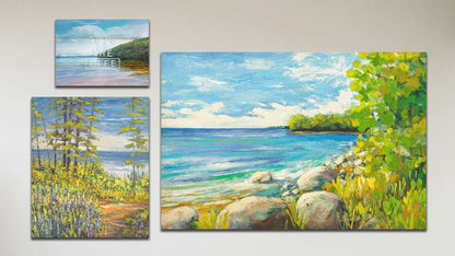 A collage of art in the standard Tranquil Harbor package, including a canvas painting of a bay from the shoreline, a canvas painting of the sea from a copse with lupine plants, and a box board photograph of a bay overlaid with the text "This is the life."