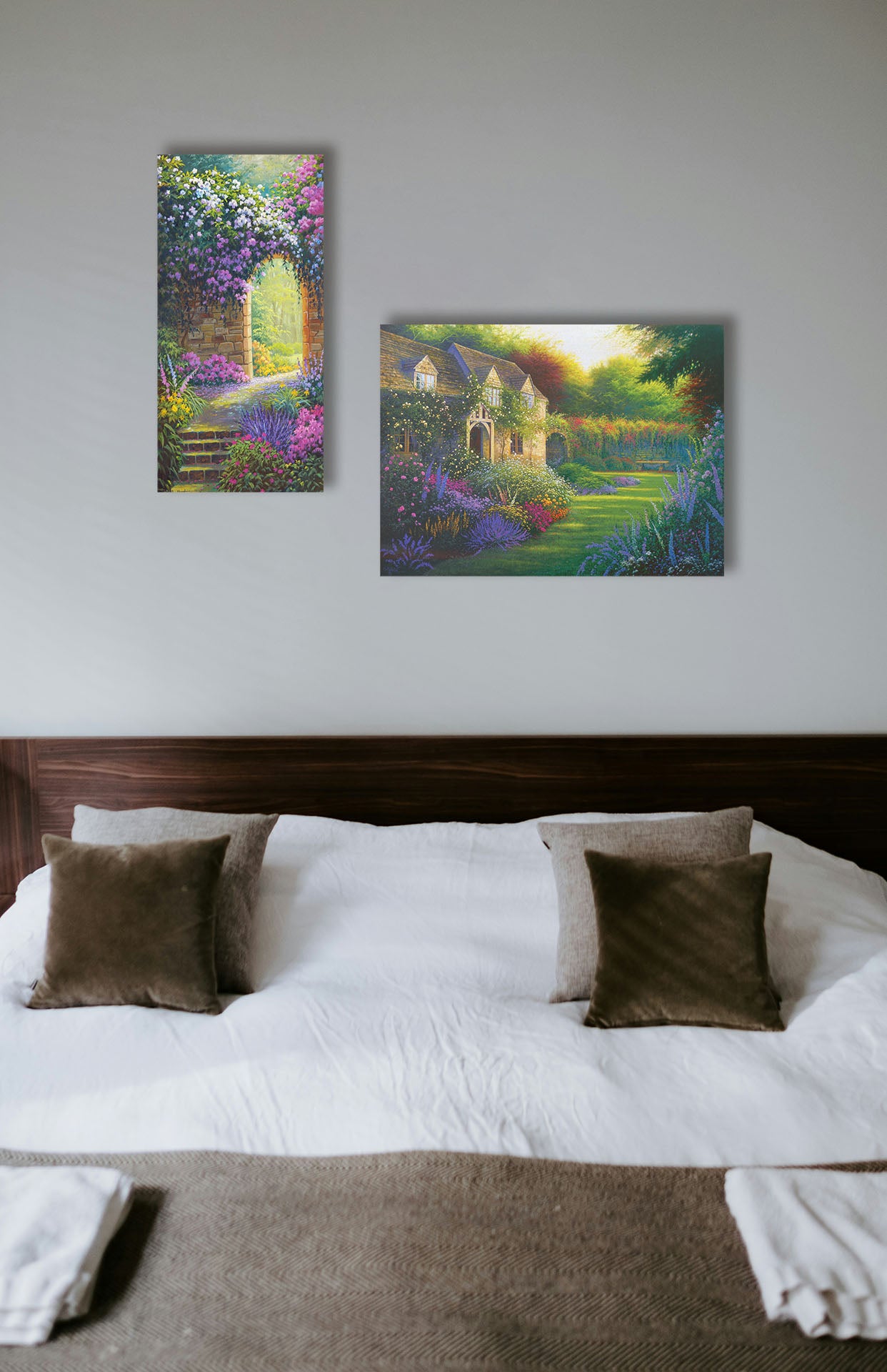 Two paintings hanging on a bedroom wall. The first is a painting of a flower garden enclosed by a stone wall. A stone path leads through an archway in the wall, where sunlight pours through trees in the distance. Printed on canvas. The second is a painting of a blooming garden, with flowers in a variety of pinks, purples, yellows, and whites. A bench site in the grassy clearing beside a cottage, draped in white-flowered vines. Printed on canvas.