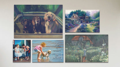 A collage of art in the standard Summer Days package, including a canvas painting of a little house surrounded by a garden, a canvas painting of a large courtyard garden, a canvas painting of three dogs riding in the back of a car, a canvas painting of two children looking at bugs on a porch, and a box board photo of a child and dog on the beach overlaid with the phrase "Life is too short, be brave."