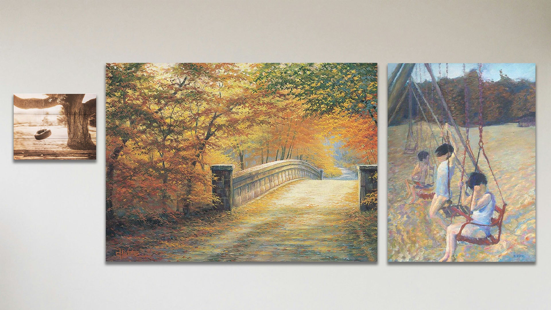 A collage of art in the standard Swingers package, including a canvas painting of children playing on a swing set, a canvas painting of a road through an autumn forest, and a box board sepia photo of a tire swing hanging from a broad tree.