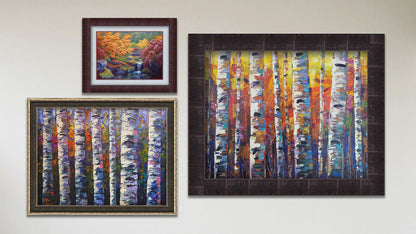 A collage of art in the designer Tangerine Dream package, including two framed paintings of colorful birch forests and a matted and framed painting of a garden with a koi fishpond.