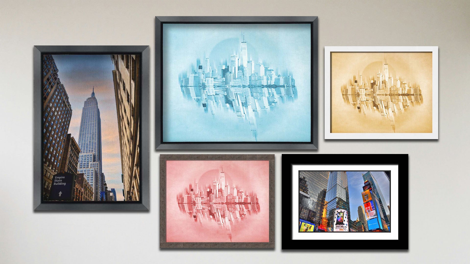 A collage of art in the designer Blue City package, including a matted and framed photograph of Times Square in New York City, a framed photograph of the Empire State Building in New York City, and three framed photographs of the city skyline in red, yellow, and blue.