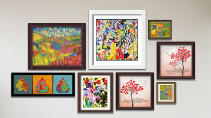 A collage of art in the designer All Day Long package, including two matted and framed paintings of a colorful cat and a colorful cow, two framed designs of trees with hearts for leaves, two framed abstract paintings inspired by floral gardens, a framed painting of an abstracted floral meadow landscape, and a framed painting of three pears.