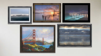 A collage of art in the designer Morning at the Golden Gate package, including three framed photos of San Francisco at sunrise, San Francisco at night, and Scripps Pier in La Jolla, CA; a framed painting of the Golden Gate Bridge; and a matted and framed photograph of the San Francisco, California, skyline.