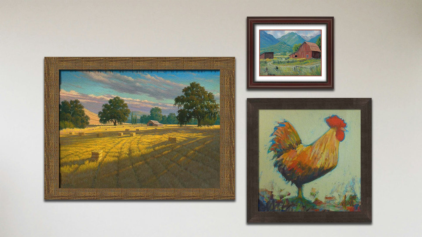 A collage of art in the luxury Sunset Hayfield package, including a matted and framed painting of a barn in the mountains, a framed painting of an orange rooster, and a framed painting of a hayfield at sunset.