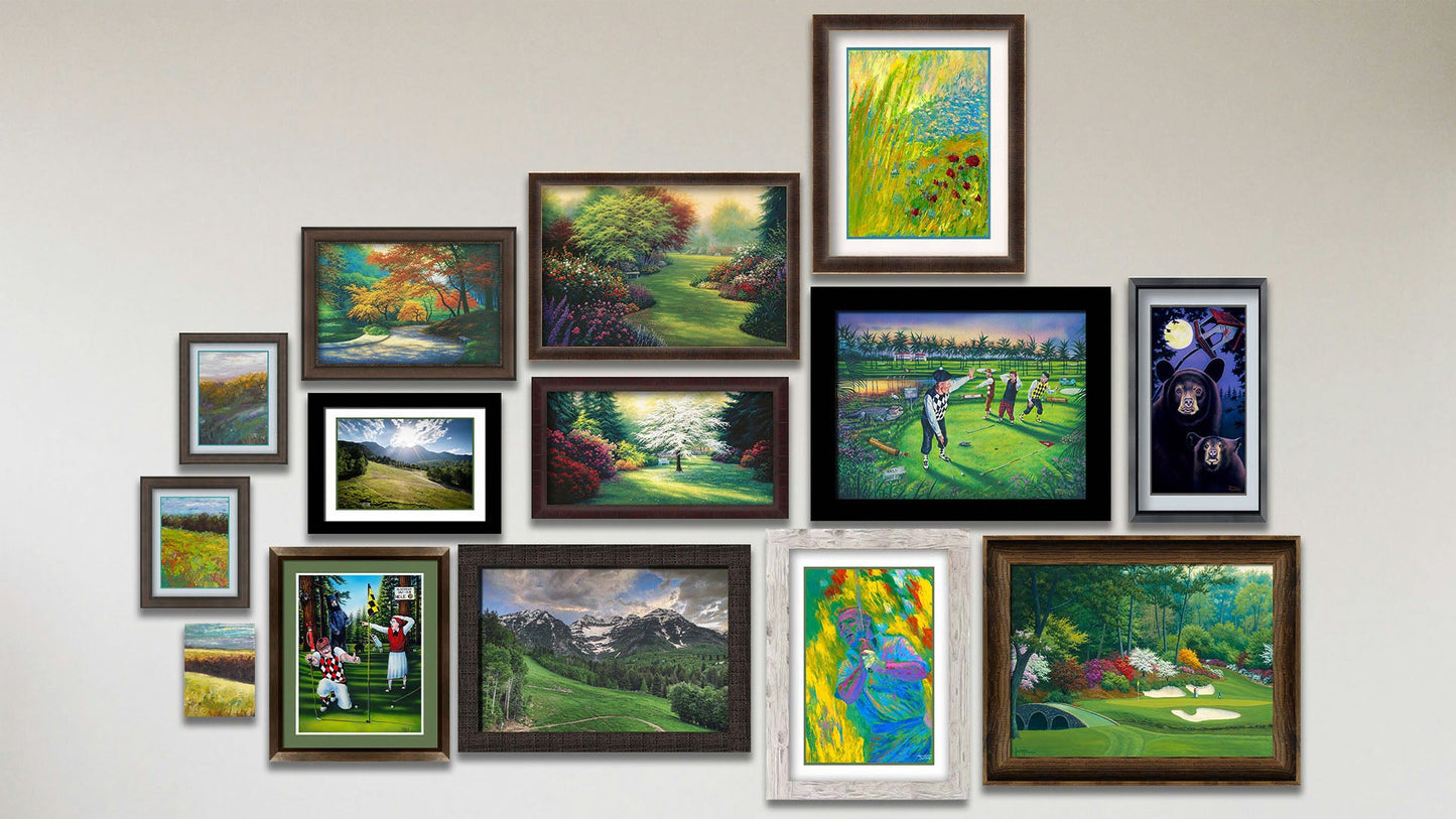 A collage of art in the designer 12th Hole at Augusta package, including six matted and frame paintings of golfers being interrupted by bears, bears at night, Arnold Palmer, a pond, and two meadow landscapes; a matted and framed photo of Mount Timpanogos; five framed paintings of a garden path, golfers being interrupted by alligators, a garden clearing, Augusta National golf course, and a road through a forest; a framed photo of Mount Timpanogos; and a canvas painting of a meadow landscape.