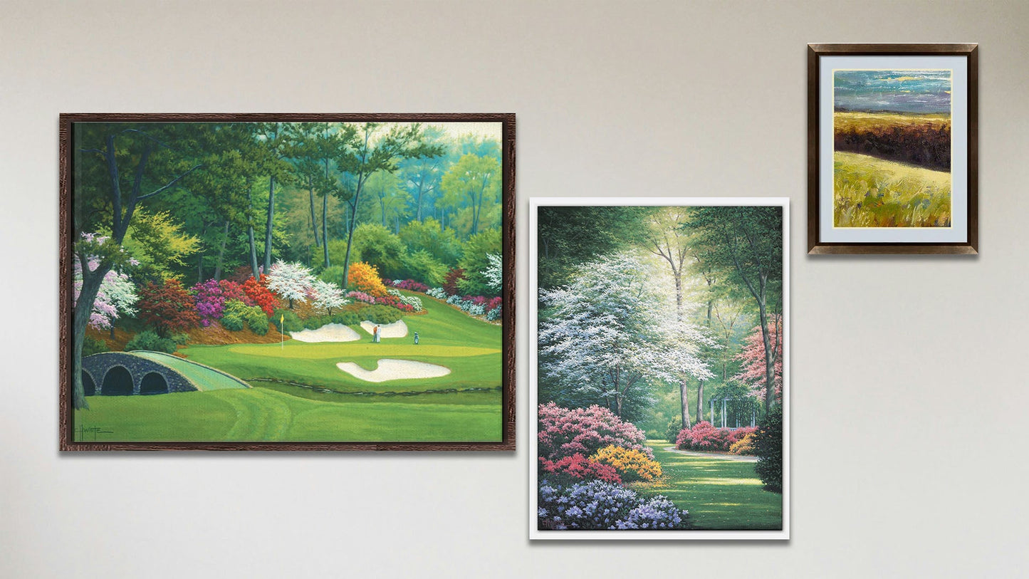 A collage of art in the luxury 12th Hole at Augusta package, including a float framed painting of Augusta National golf course, a float framed painting of a garden clearing with a gazebo, and a matted and framed painting of a meadow landscape.