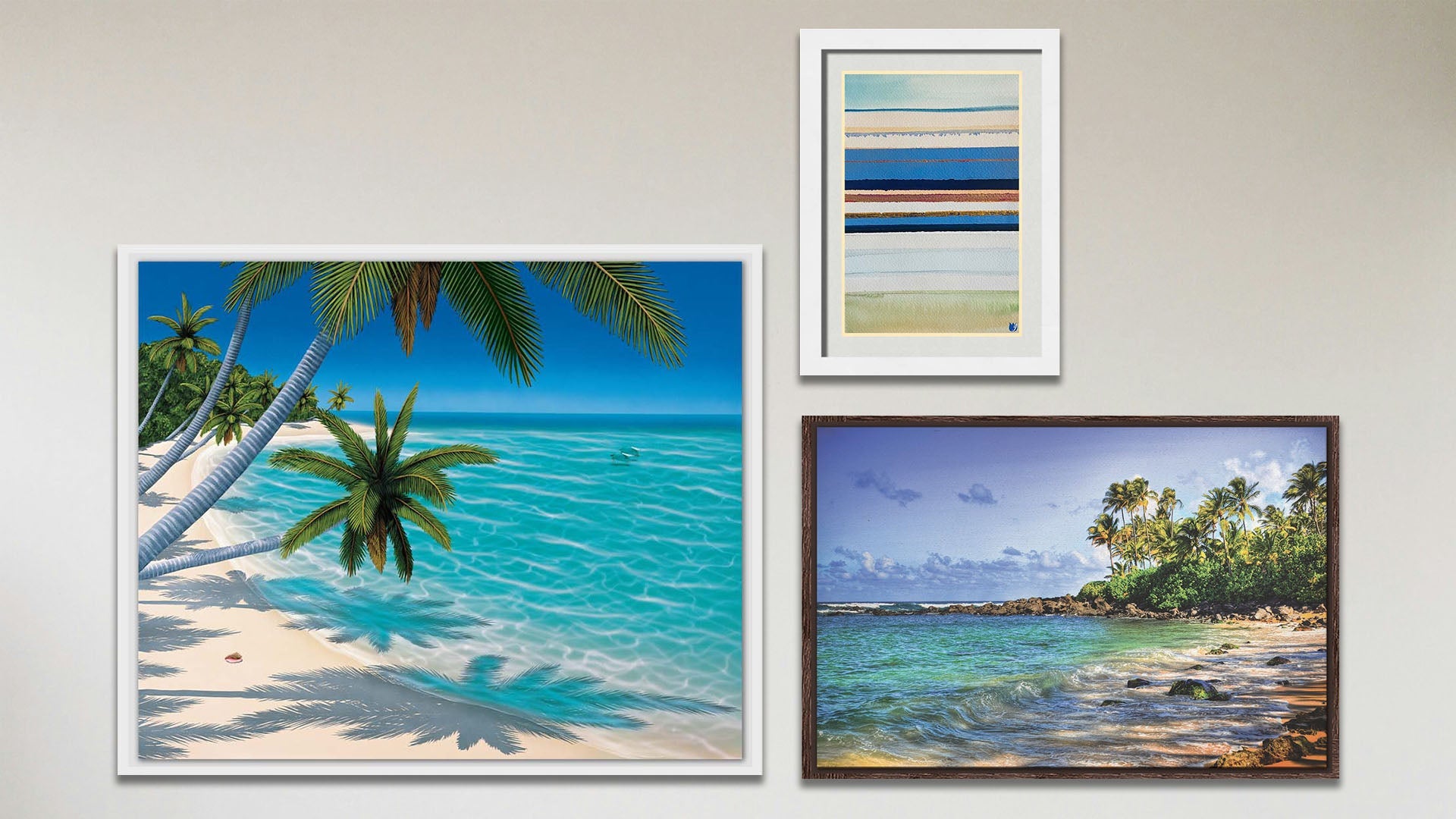 A collage of art in the luxury Barefoot Beach package, including a float framed painting of a vibrant tropical beach, a float framed photograph of Laniākea beach (nicknamed Turtle Beach) on Oʻahu, Hawaiʻi, and a matted and framed abstract geometric painting invoking boats, the shore, and sea.