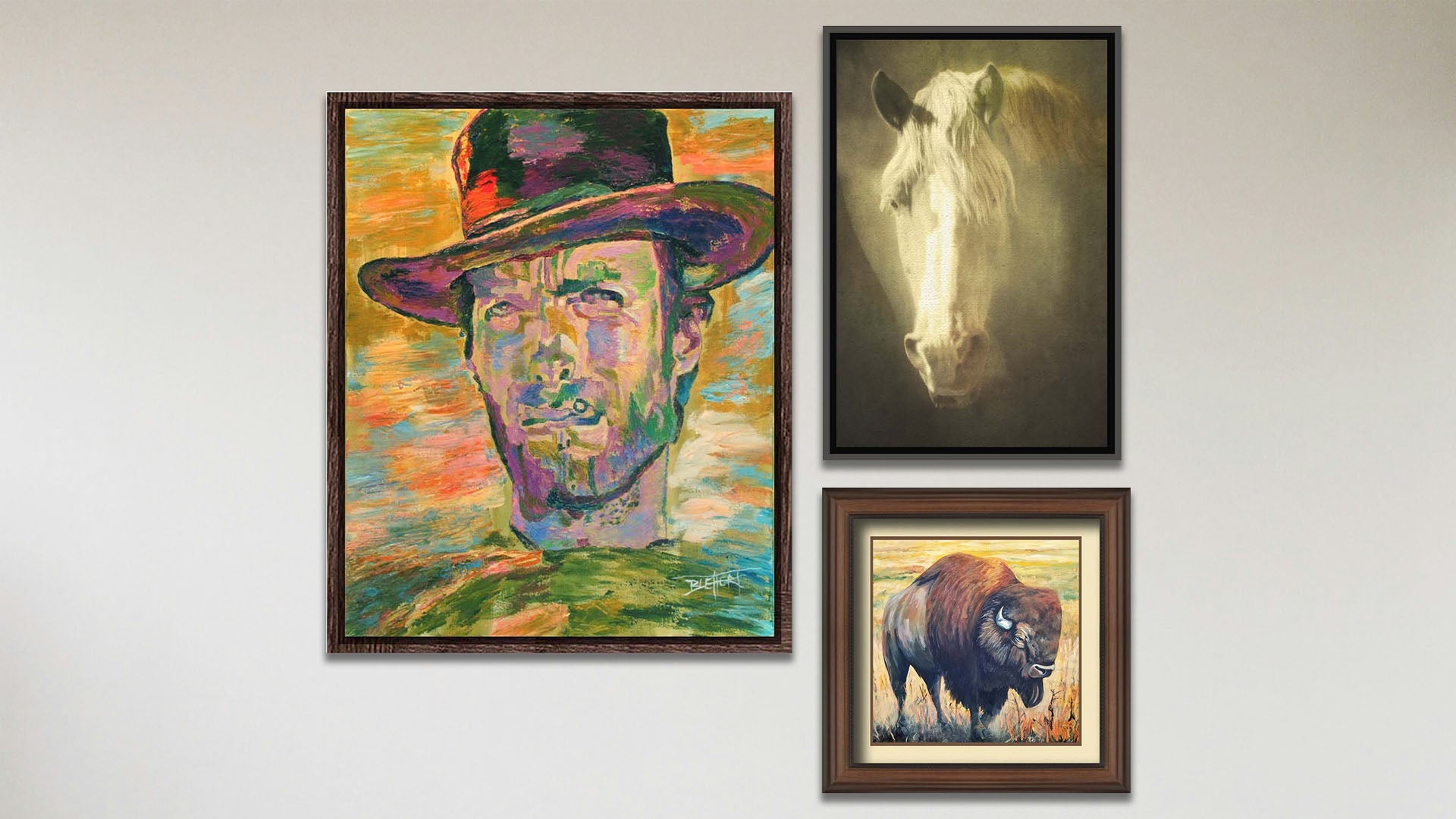 A collage of art in the luxury Clint Eastwood package, including a float framed painting of Clint Eastwood, a float framed photograph of a sepia horse, and a matted and framed painting of a bison.