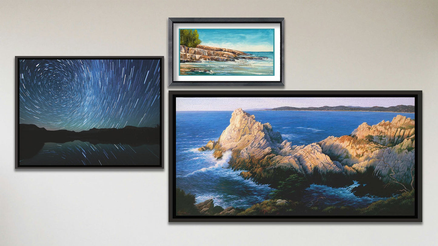 A collage of art in the luxury Pinnacle at Sunset package, including a float framed long-exposure photograph of the stars reflecting off Mirror Lake in Utah, a float framed painting of the cliffs at Cypress Grove Trail Point Lobos in California, and a matted and framed painting of Artist's Point Lake Superior in Minnesota. 